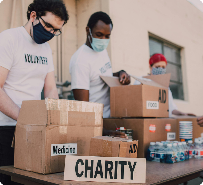 Volunteers preparing aid boxes